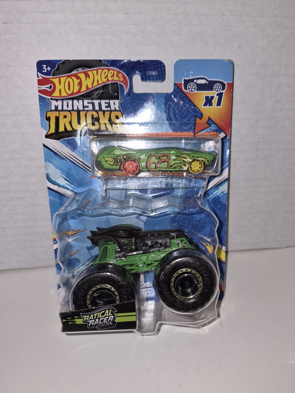 NEW HOTWHEELS MONSTER TRUCKS RATICAL RACER AND CRUSHED CAR